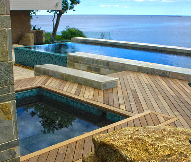 Beautiful exotic hardwood pool deck built with Ipe Clip® hidden deck fasteners