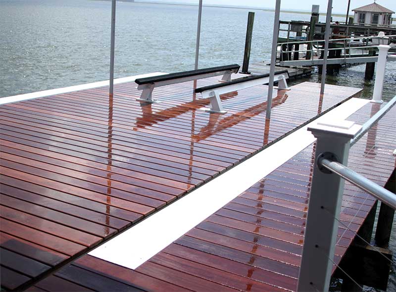 Freshly oiled dock constructed with hidden edge mount fastener clips by Ipe Clip®